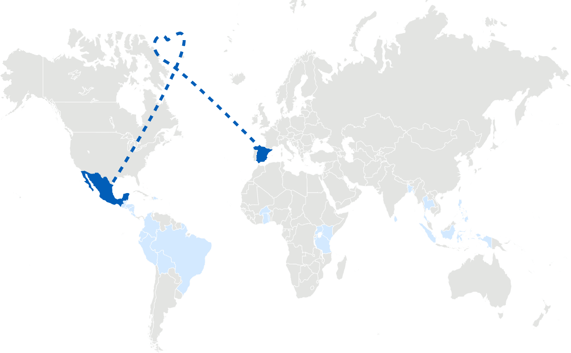 A world map indicating the 29 countries in which churches operate child development programs in partnership with Compassion. A dashed line with a heart-shaped flourish is superimposed on the map, connecting Spain and Mexico.